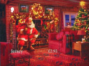 Timbre - Le père Noël livrant les cadeaux dans une maison bien décorée.