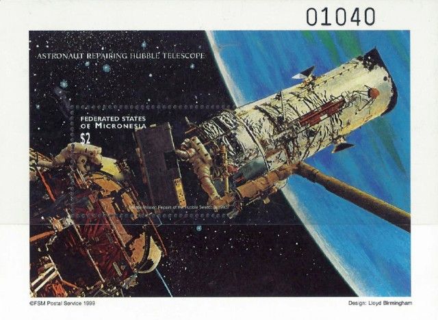 Timbre- La réparation du télescope Hubble par les astronautes.
